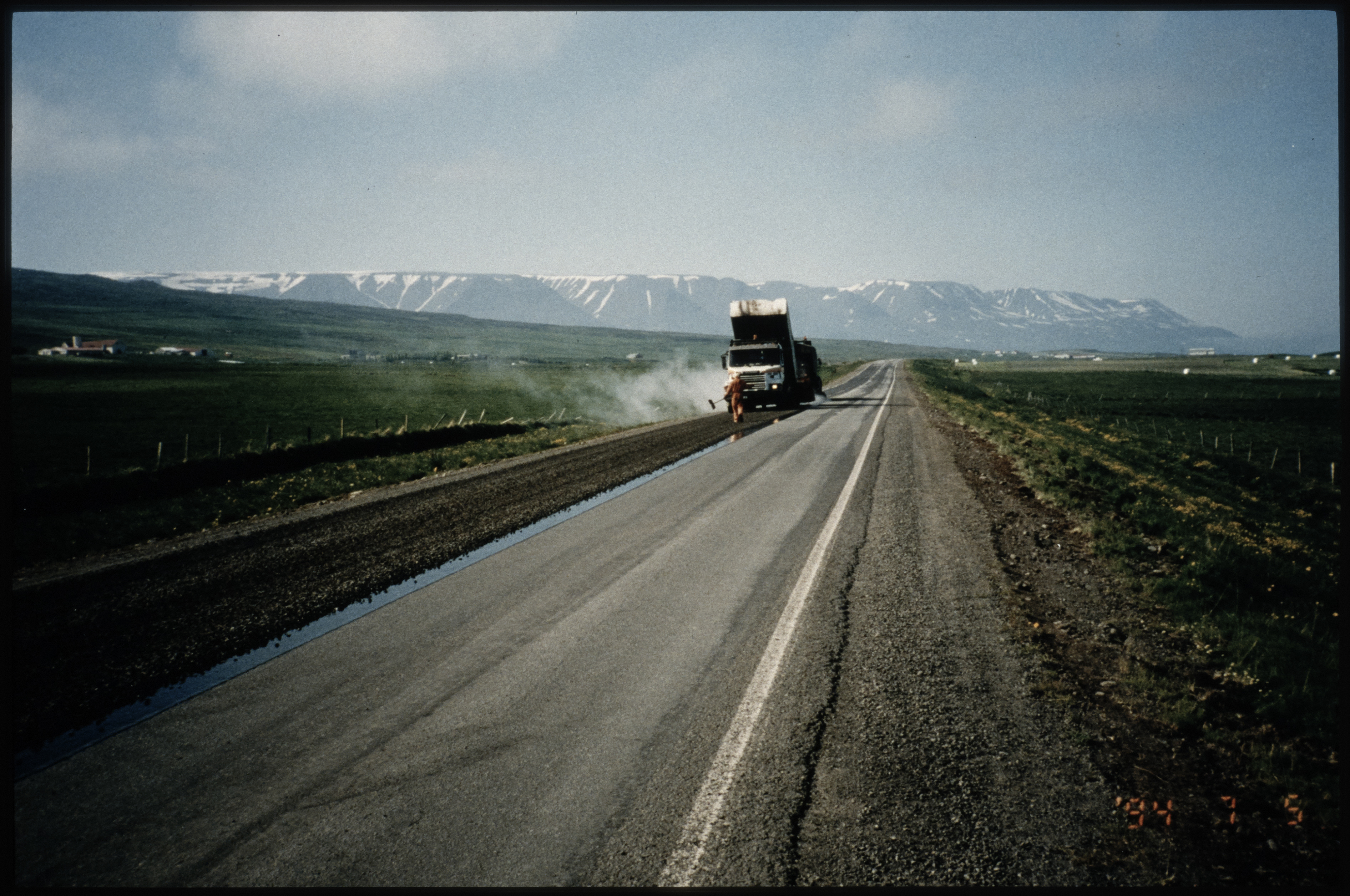 Road construction in the background are mountains